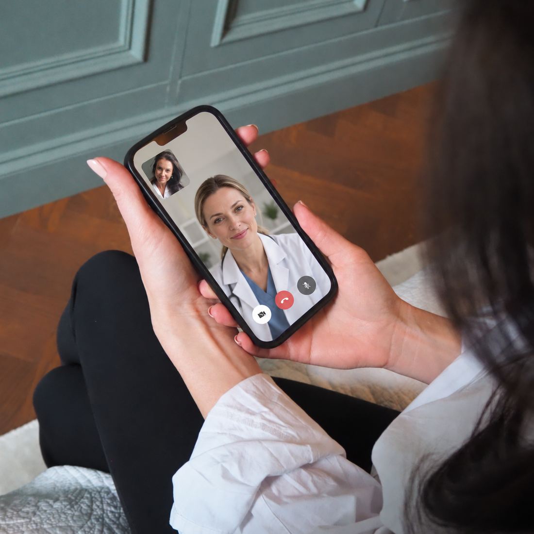 Woman on a video call with a doctor on her phone